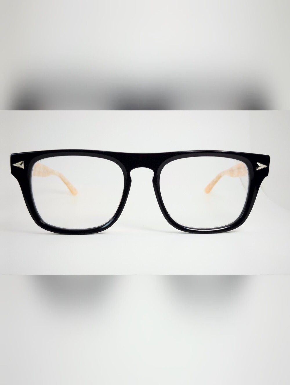 Fluoresce. Black Wayfarer-Style Eyeglasses with Pearl Temples.